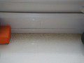 Interior Window-sill covered in sand