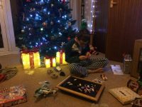 Lego building in Xmas pyjamas