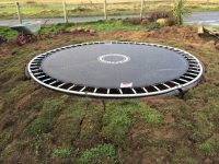 Ground level trampoline