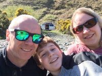 Family Selfie with Ramsey the Camper in the background