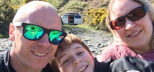 Family Selfie with Ramsey the Camper in the background