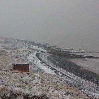 Snowfall on the beach