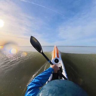Out through the waves