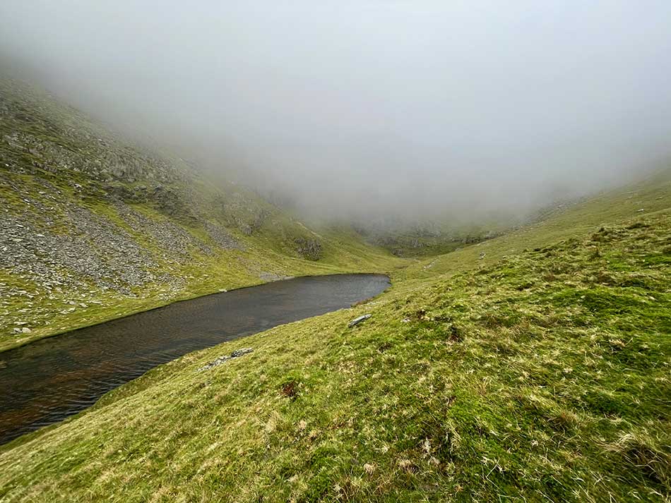 At Checkpoint AG(30) with the climb to the Carneddau shrouded in mist