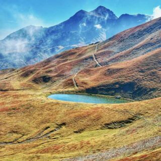 Looking back at our campsite with Gjervica that we summited yesterday in the background
