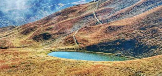 Looking back at our campsite with Gjervica that we summited yesterday in the background